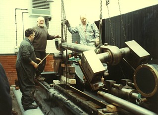 Removing the connecting rod and cross-head assembly.