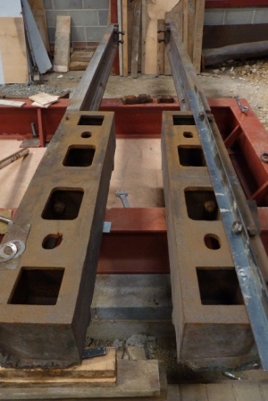 The two sides of the cast iron entablature. In the foreground (on the end of the box section) you can just see the jagged edges where the ot