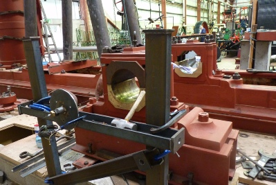 The outer and inner bearings. The steel frame in the forground shows a steel disc with a threaded screw to tension the piano wire. Unfortuna