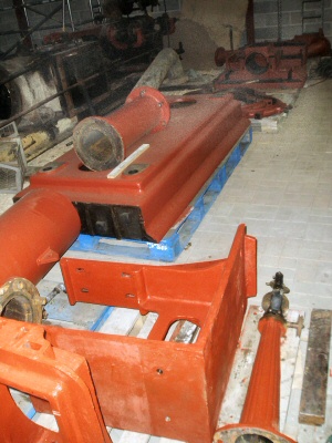 Some parts of 'Rhoda' have been cleaned and painted with red primer.